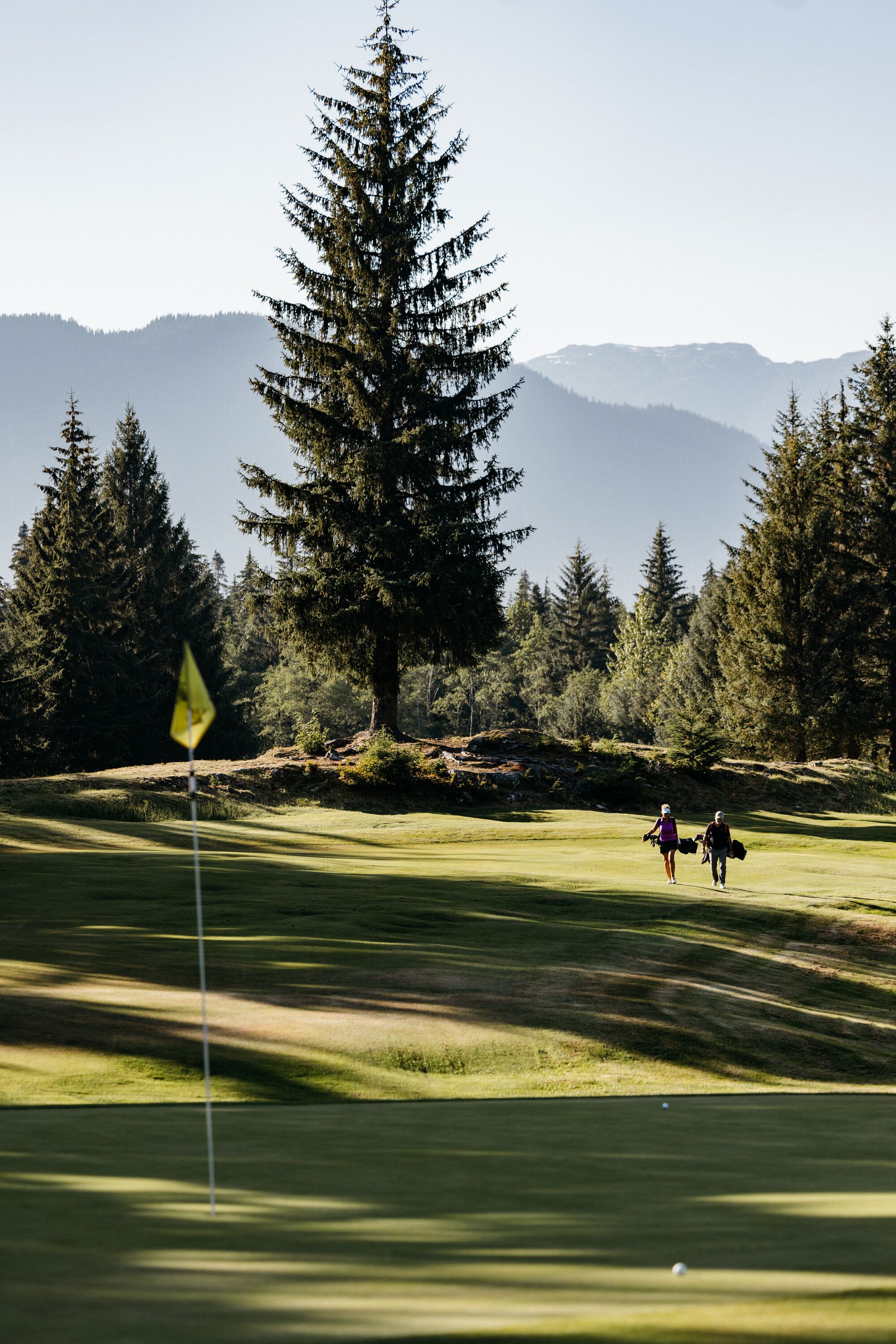 Golfers on Hirsch Creek fairway